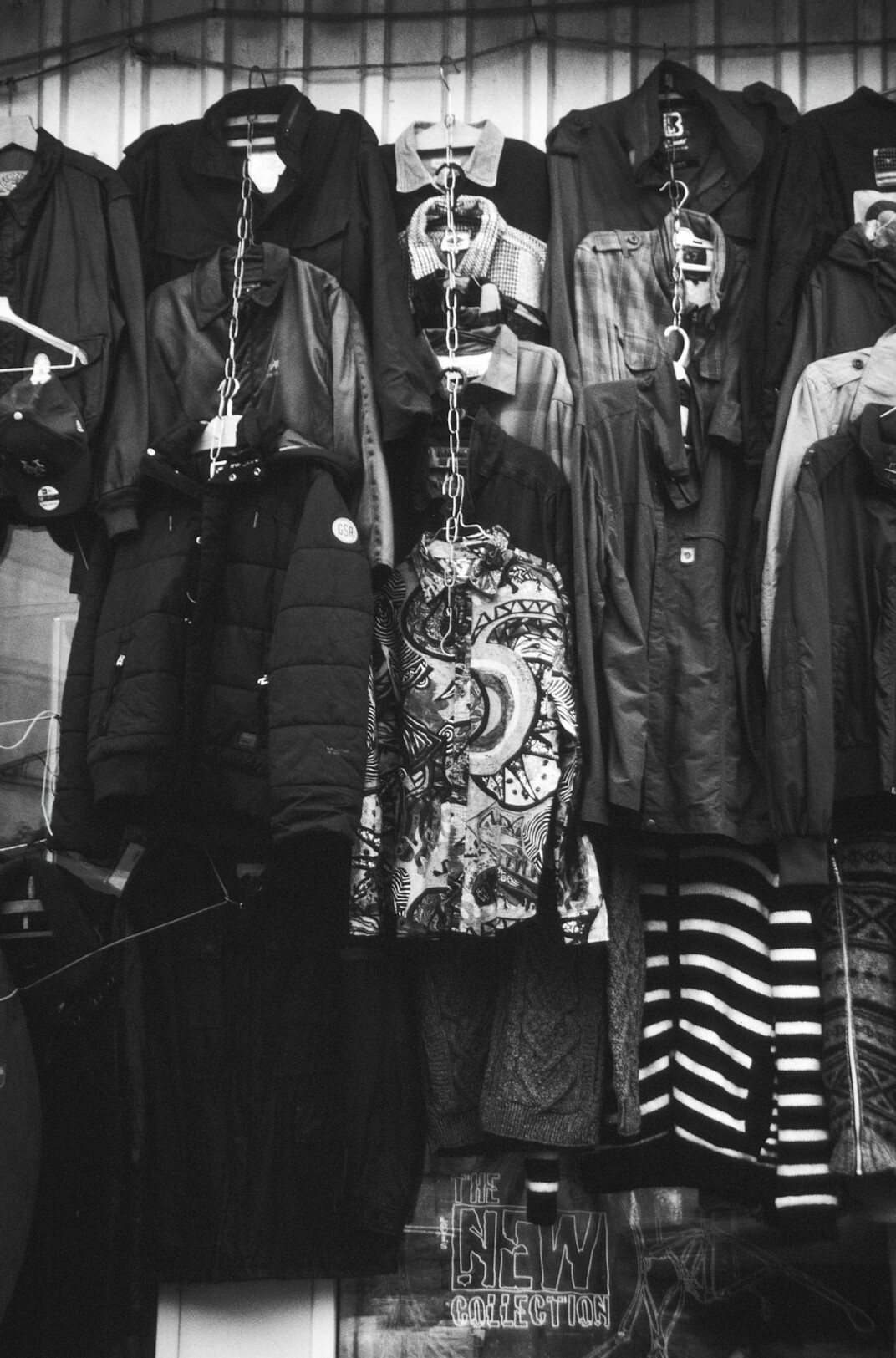 detective in plain clothes at clothing store